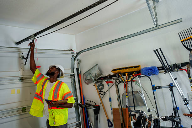 Professional Garage Door Spring Repair technician working in Lathrup Village, MI